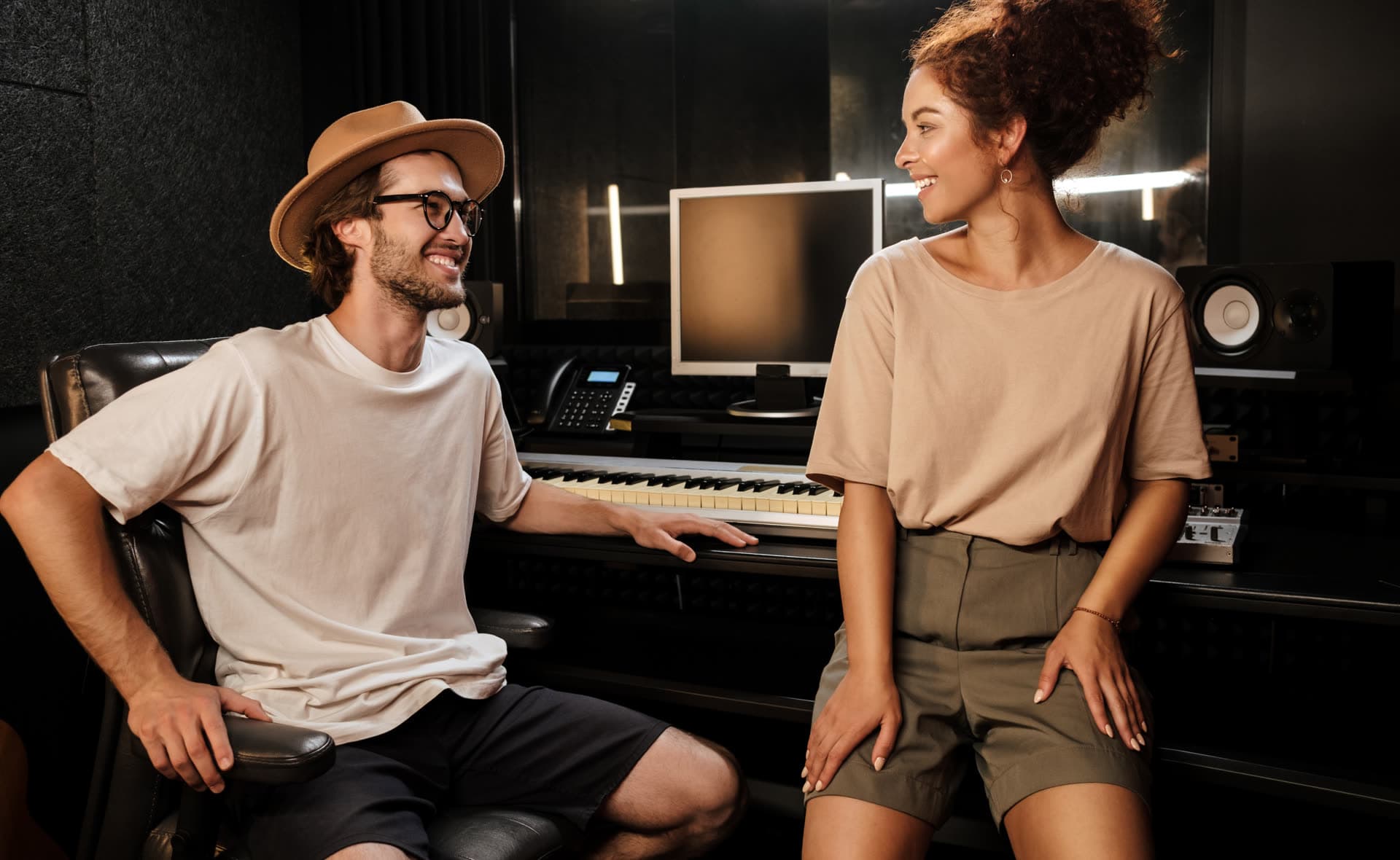 Musicians collaborating in a modern recording studio